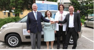 Crown Prince and Crown Princess Deliver Car tо General Hospital Uzice and Aid to Shelter in Kragujevac